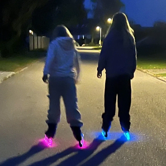 Patine în linie Story Midnight reglabile Negru și galben LED